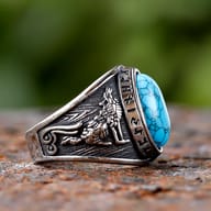 Close-up of the blue stone and Futhark runes on the 316L stainless steel Viking ring band.
