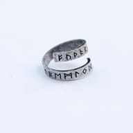 Lifestyle shot of the Viking rune ring on a man's hand, illustrating its fit and style.