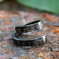 Side profile of the men's amulet ring, emphasizing the thickness and craftsmanship of the Viking-inspired piece.