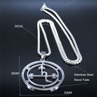 Close-up of the 316L stainless steel Lilith seal pendant's right side, with the durable box chain visible next to it.
