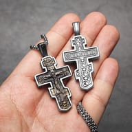 Mid-section detail of the Orthodox Crucifix pendant, showing the figure of Christ and surrounding saints.