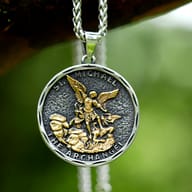 Detailed view of the St. Michael pendant with "THE ARCHANGEL" inscription on the right.