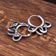 Close-up of the upper part of the other 316L stainless steel snake hoop earring, showcasing the durable hoop and intricate snake detailing.