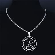 Side view detail of the polished 316L stainless steel Mammon sigil pendant and chain links.