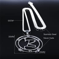 Angled shot highlighting the durable construction of the Mammon sigil stainless steel pendant.