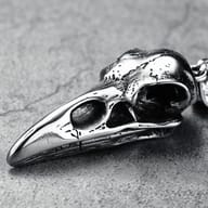Detailed view of the top of the 316L stainless steel crow skull pendant, highlighting its textured finish.