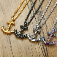 Extreme close-up of the anchor's lower fluke, emphasizing the polished stainless steel and intricate rope winding.