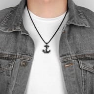 The anchor pendant from a slightly different angle, revealing more of the chain connection point.