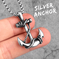 Close-up of a silver-tone 316L stainless steel anchor pendant with a coiled rope design, attached to a chain.