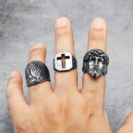 Detailed close-up of the crown of thorns and forehead on the 316L stainless steel Jesus ring.
