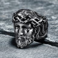 Frontal shot of the Jesus head ring, showcasing the powerful and reverent depiction.