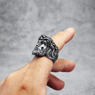 Angled view of the men's Jesus ring, highlighting the detailed facial features and textured hair.