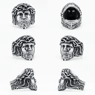 The men's Christian ring with Jesus's face in a slightly different lighting, revealing the metallic luster.