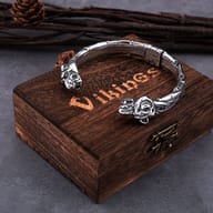 Side profile highlighting the detailed grooves and metallic finish of the wolf bracelet