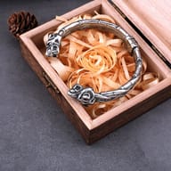 Overhead angle showing the textured band and open cuff design of the steel bracelet