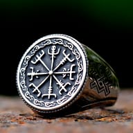 Men's 316L stainless steel Viking Vegvisir compass signet ring on a rustic surface