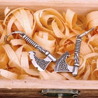 Detailed front view of Viking battle axe drop earrings with Celtic knot engraving