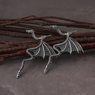 Detailed shot of the earring stud post and silicone backing on the stainless steel dragon