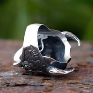 Frontal view of the Viking warrior skull ring, highlighting the open jaw and intricate teeth