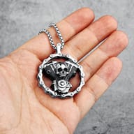 Close-up of the durable stainless steel chain connecting to the skull engine pendant, highlighting its sturdy bail.