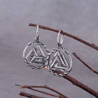 Close-up of stainless steel Valknut drop earring detailing the interlocking triangles