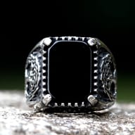 Close-up of the black rectangular centerpiece of the Viking stainless steel ring.