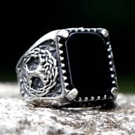 Side profile of the stainless steel Yggdrasil ring, emphasizing the textured band.