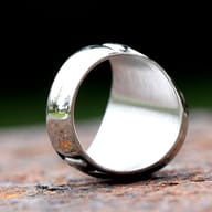 Side view of the vintage 316L stainless steel ring, highlighting the hexagram and band's texture.