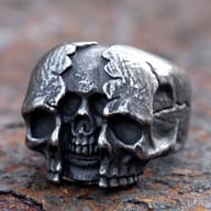 Front view of antique finish split calvarium skull stainless steel ring