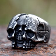 Side profile showing cracked textured skull design on heavy steel band