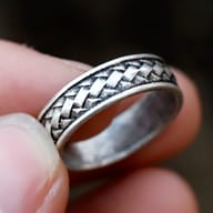 Close-up of the intricate braided pattern on the Men's 316L stainless steel ring