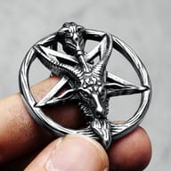 Upper right section of the Baphomet Pentagram necklace, featuring the word 'SATAN' in white text.