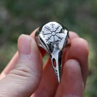 Full profile view of the polished 316L stainless steel raven head ring with a Vegvisir design.