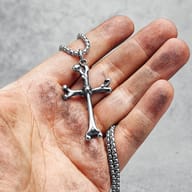 Close-up of the top of the 316L stainless steel bone cross necklace pendant and connecting bail.