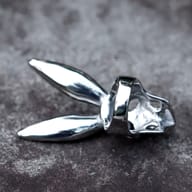 Side profile highlighting the sturdy stainless steel band and ear contour
