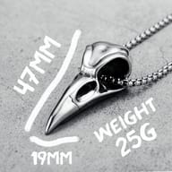 Lifestyle shot of the 316L stainless steel crow skull pendant necklace, highlighting its wearability.