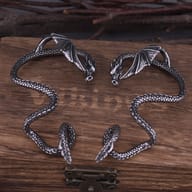 Detailed close up of the sculpted dragon head and wings on the ear wrap