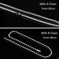 Men's skull pendant shown styled on a stainless steel chain